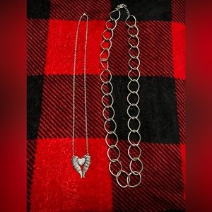 Two women’s necklaces, silver color.